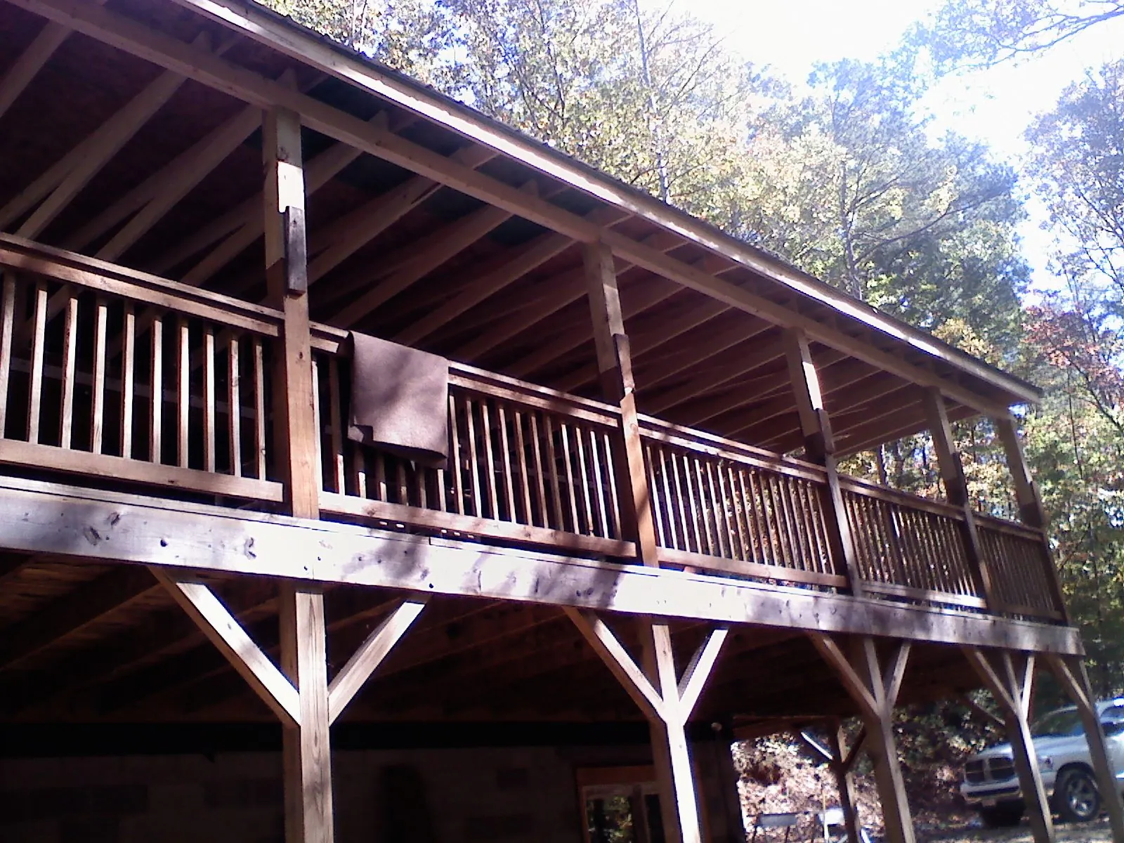 Timber framing under a new elevated porch and deck — Roof Leak Repair in Wild Rose by Roofing Brothers